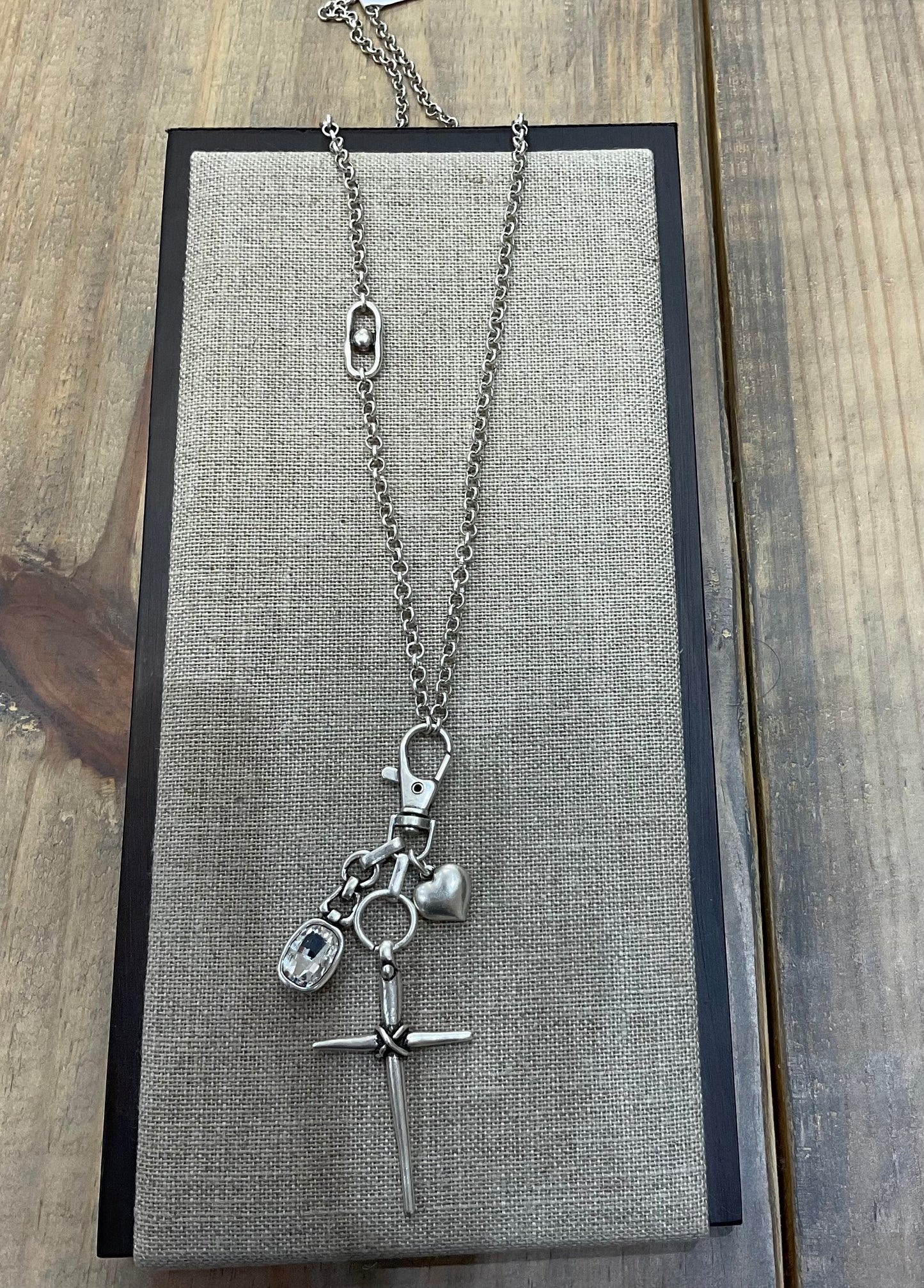 LONG CROSS CHARMS NECKLACE