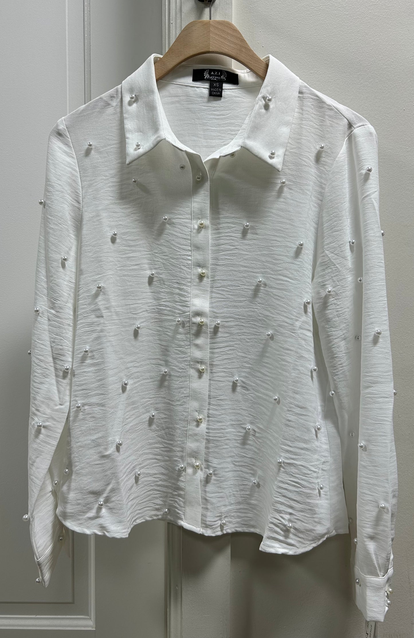 EBONY PEARL BUTTON TOP