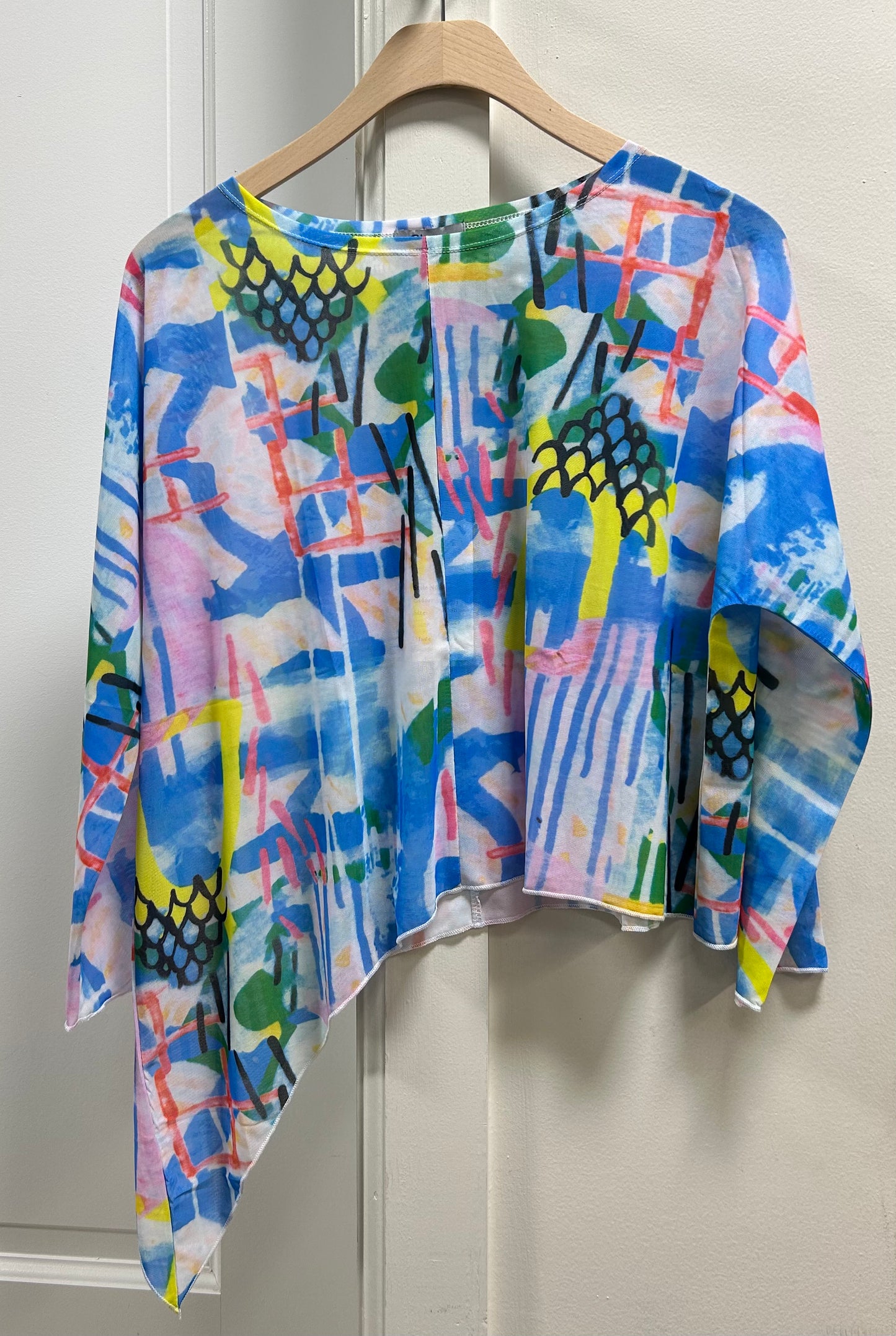 ASYMETRICAL MESH TOP