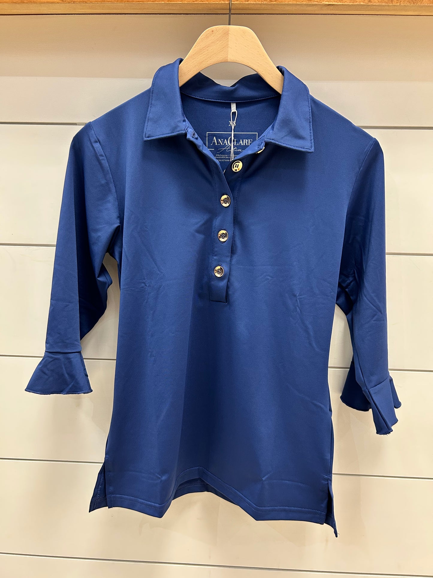 MIRA FLOUNCE SLEEVE POLO TOP